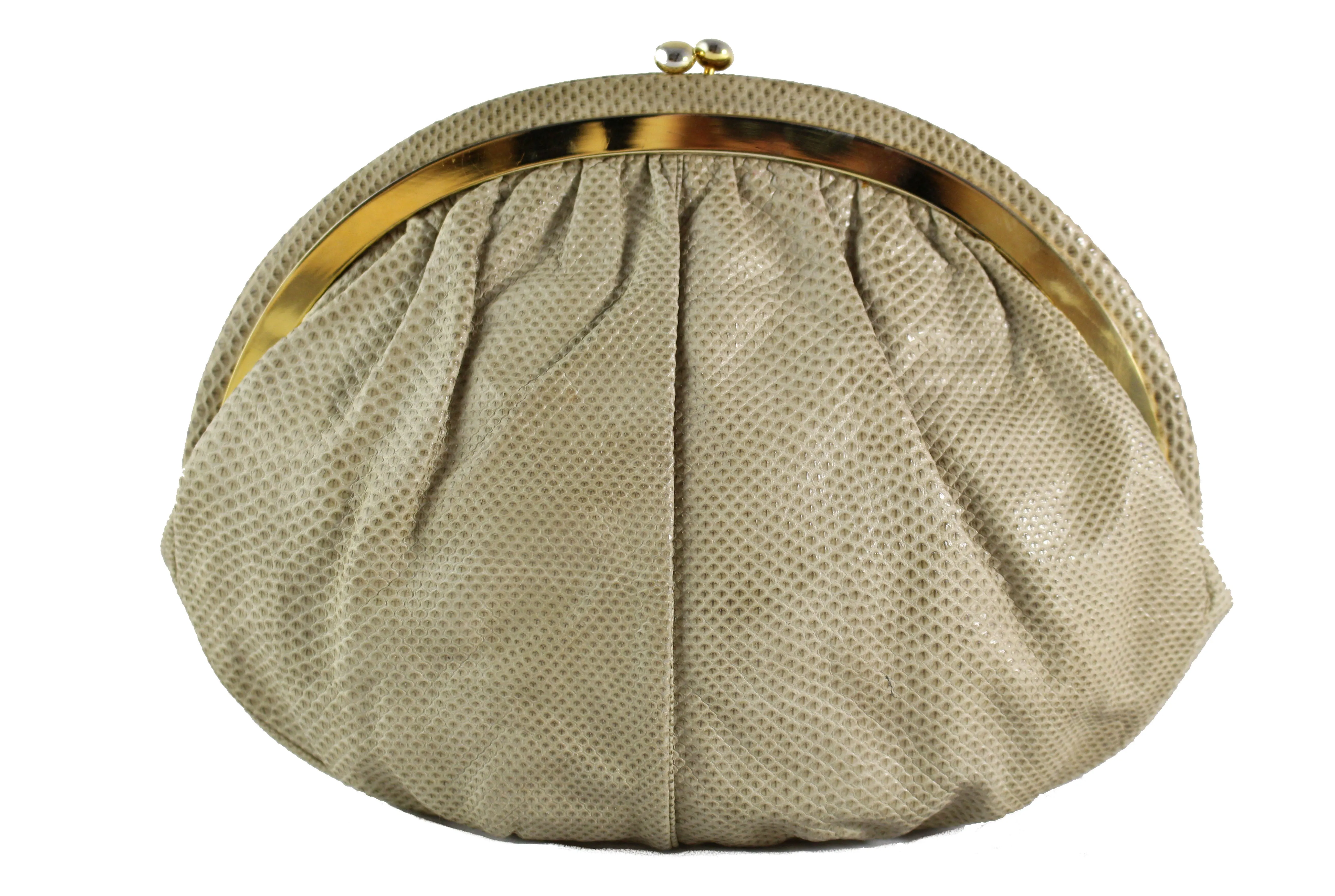 JUDITH LEIBER beige snake skin clutch with semicircular jewel frame