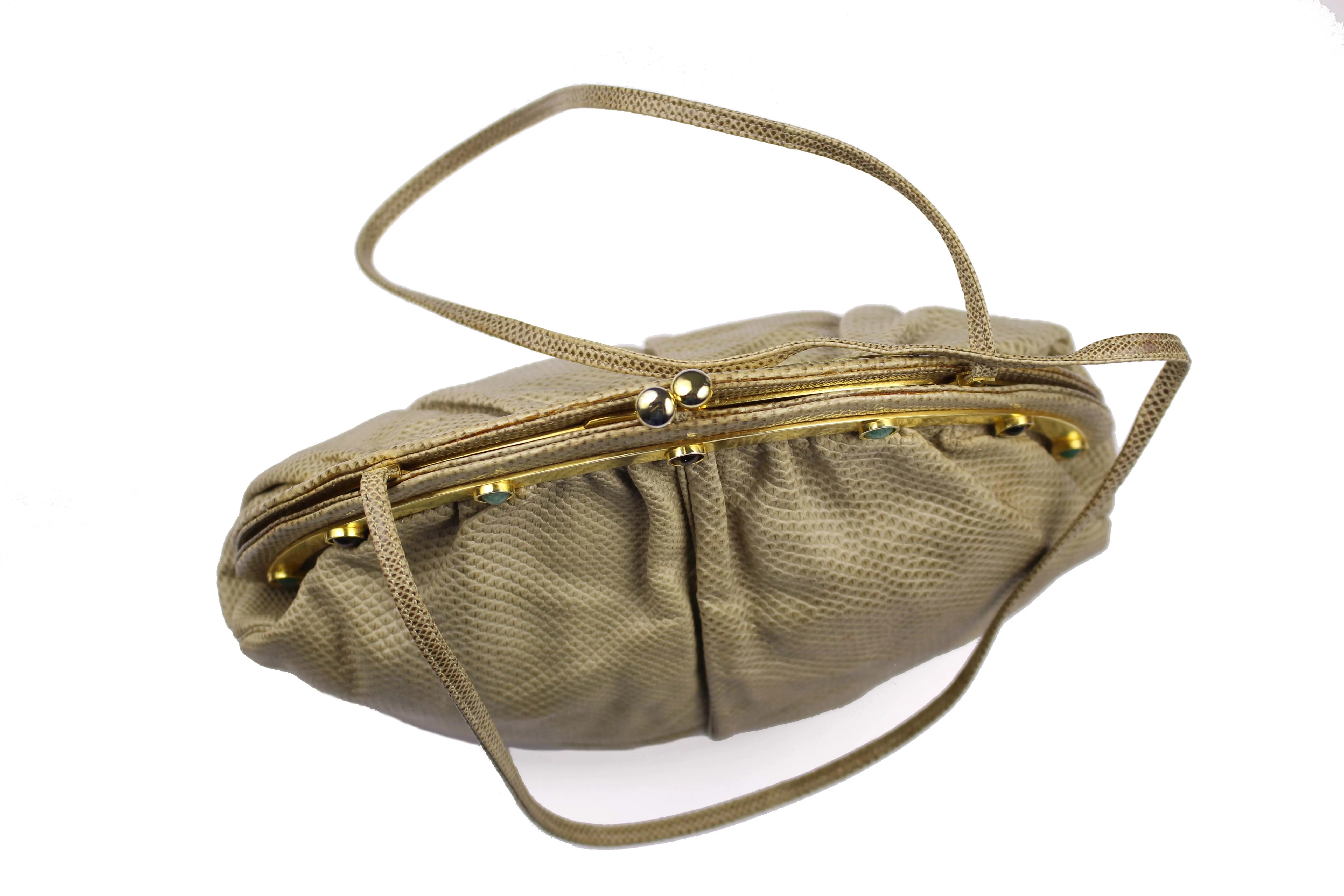 JUDITH LEIBER beige snake skin clutch with semicircular jewel frame